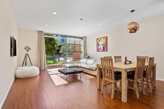 Sleek Modern Pad next to Spark Arena Zodiak Stays - 4