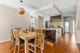 Sleek Modern Pad next to Spark Arena Zodiak Stays - 5