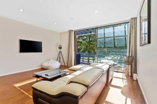 Sleek Modern Pad next to Spark Arena Zodiak Stays - 1