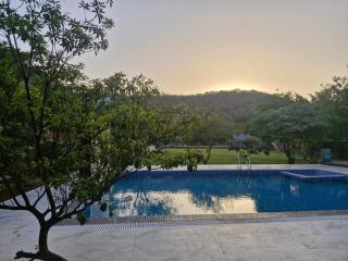 Aravalli Hills golden farm, Luxury Tents & AC rooms with scenic views - 0
