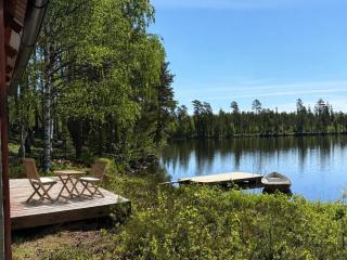 Secluded lake house with a private jetty and a boat - 5