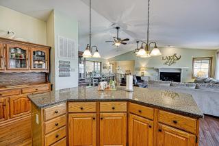 Lakefront retreat with a large yard, stone fire pit, gazebo, deck, & dock - 9