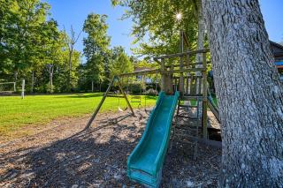 Lakefront home with private hot tub, WiFi, fun rec room, & beach area - 9