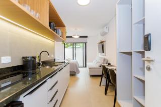 Apartamento 101 - Eixo · Studio c/ Garden Privativo e Cozinha Completa - 8