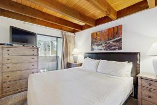 Lakefront retreat with shared pool hot tub & sauna - near shopping & skiing - 1