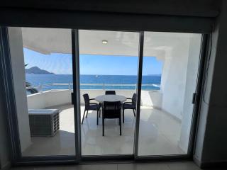 INCREIBLE DEPARTAMENTO A PIE DE PLAYA EN MANZANILLO, COMPLETAMENTE NUEVO - 9