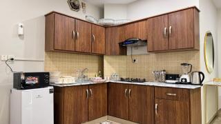 Exquisite 1BR Apartment with Terrace Near Giga Mall - 5