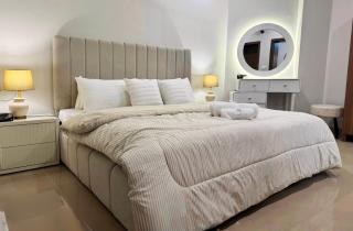 Exquisite 1BR Apartment with Terrace Near Giga Mall - 1