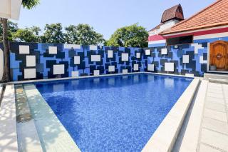 RedDoorz at Putri Inn Homestay Sanur - 5