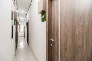 RedDoorz Plus at Grand Tara Homestay Palembang - 9