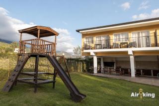 Suites Amplias y Comfortables - Con Balcon, Parquizado, Asador y Pileta - 4