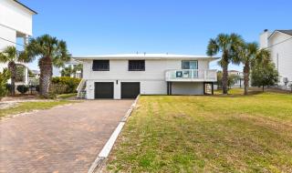 Canal-front home with pool 40' boat slip gated beach access - 1 block to sand - 9