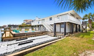 Canal-front home with pool 40' boat slip gated beach access - 1 block to sand - 5