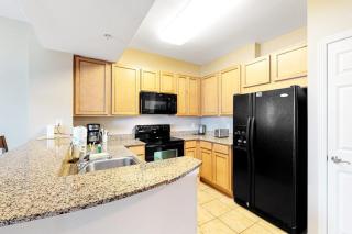 Resort condo with balcony shared pool hot tub gym tennis WiFi and AC - 3