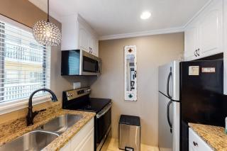 Cozy coastal condo with pool easy beach access balcony & canal views - 4