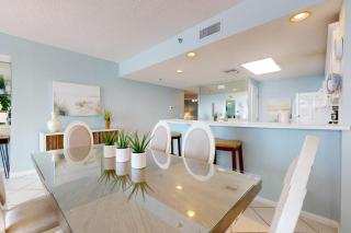 Vibrant condo on the Gulf with pool fitness room & playground - 2
