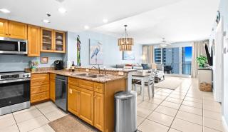 Bright beach condo with water views & private balcony - pool gym & beach - 5