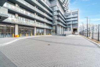 Sleek 2BR Condo with Balcony & Skyline Views - 1