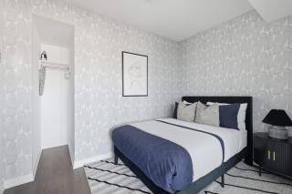 Sleek 2BR Condo with Private Patio & Parking - 7