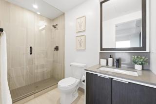 Sleek 2BR Condo with Private Patio & Parking - 6