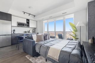 Sleek 2BR Condo with Private Patio & Parking - 5