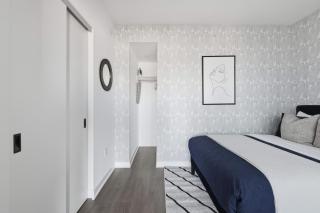 Sleek 2BR Condo with Private Patio & Parking - 1