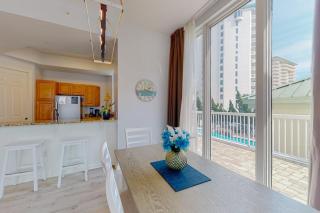 Garden-view condo with lagoon & kid's pools beach access on-site eateries & AC - 5