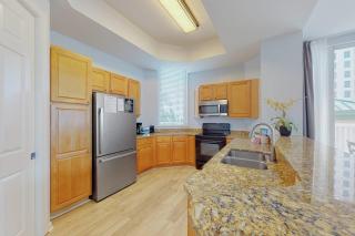 Garden-view condo with lagoon & kid's pools beach access on-site eateries & AC - 2