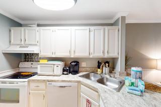 Dog-friendly charming beach condo with pool hot tub sauna deck & water access - 1