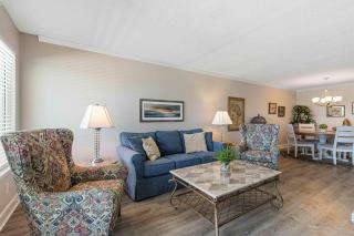 Updated beachfront condo with beach setup - quick drive to entertainment - 7