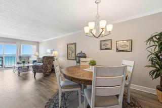 Updated beachfront condo with beach setup - quick drive to entertainment - 2