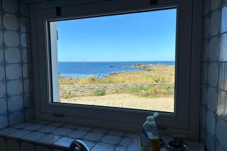 House near wild coast and castle - 2