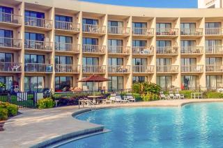 Cozy coastal efficiency with kitchenette balcony with sound views & pool - 3