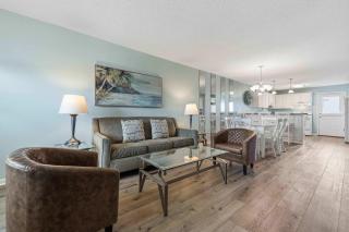 Cozy coastal condo with shared pool wifi and beach access - 7
