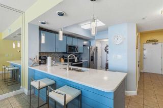 Waters Edge 211 Beach Happy- 2nd Floor Waterfront Condo with Central AC Washer&Dryer & Shared Pools - 2