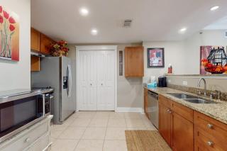 2nd-floor condo with balcony at Waterscape Waterfall lazy river & beach chairs - 3