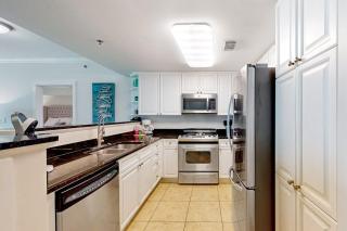 Sunny Waterscape ground-floor condo with pools hot tubs & stunning Gulf views - 4