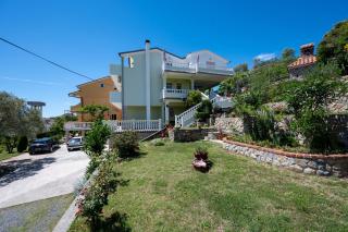 Apartments with parking space Palit, Rab - 22743 - 2