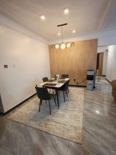modern serenity suites apartments with swimming pool,modern equipped gym,private parking space, children playing ground, proximity to major shopping malls and unbeatable city views - 8