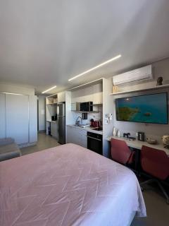Studio 1502 com sacada, garagem e A/C - 1