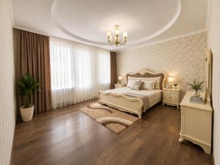 Classic beige one-bedroom in the center of Almaty in NurlyTau business district - 6
