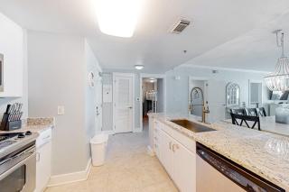 Sixth-floor condo with partial Gulf views pools hot tub private beach - 1