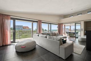 Villa 67 – Pastel Palette | Designvilla aan het strand met uitzicht over het water - 1
