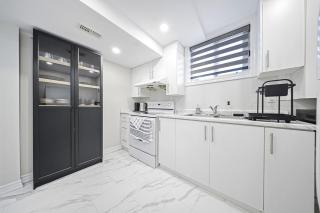 Bright Basement Suite w Parking near McLennan Park - 2