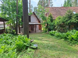Domek nad jeziorem z łódką - 7