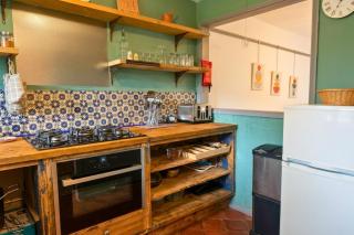 Stylish 1BR Retreat with Garden and Rustic Kitchen - 3