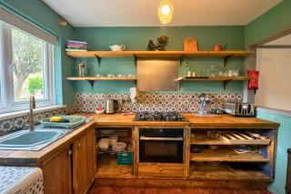 Stylish 1BR Retreat with Garden and Rustic Kitchen - 1