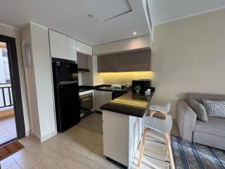 Elegant 1BR Pool View Apartment Aldau Heights - 4