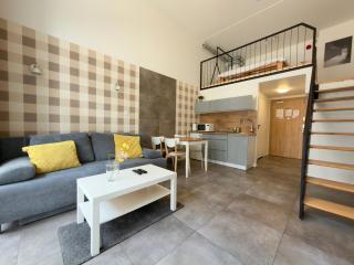 Wrocław Airport Apartment with Mezzanine by BookingHost - 0
