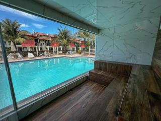 Casas no Residencial Mont Sinai com 2 ou 3 suítes (todas com ar), internet privativa 300MBPS a aproximadamento 250m da Praia de Taperapuã, condomínio com piscinas adulto e infantil, sauna, churrasqueiras e Segurança 24hrs. - 9
